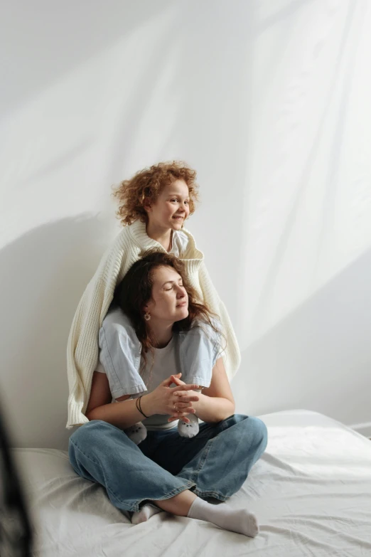 two women that are sitting down together