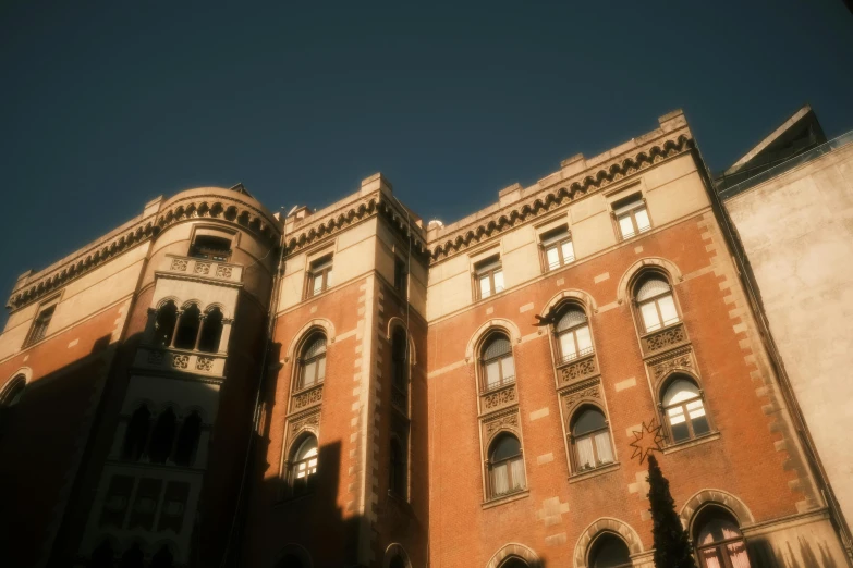 a building with lots of windows and a clock on the front