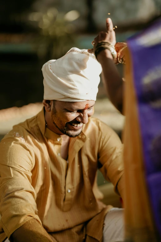 a man with a white turban on his head