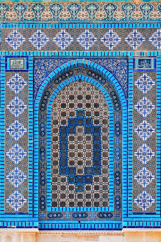 a blue and white structure with intricate details