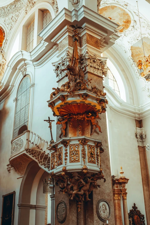 a church with clocks and ornate wall decoration