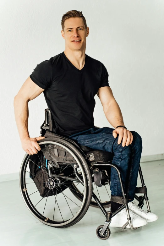 a man in a wheelchair that has wheels