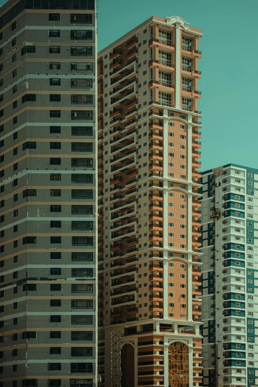 a view of a couple of tall buildings in the city