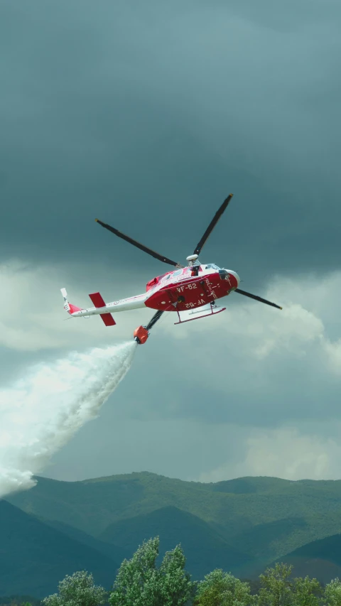 a helicopter that is flying through the sky