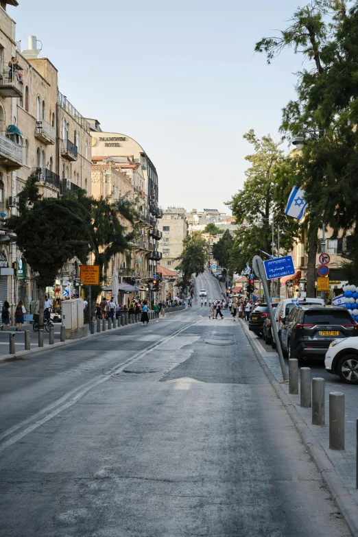 a street lined with trees on both sides