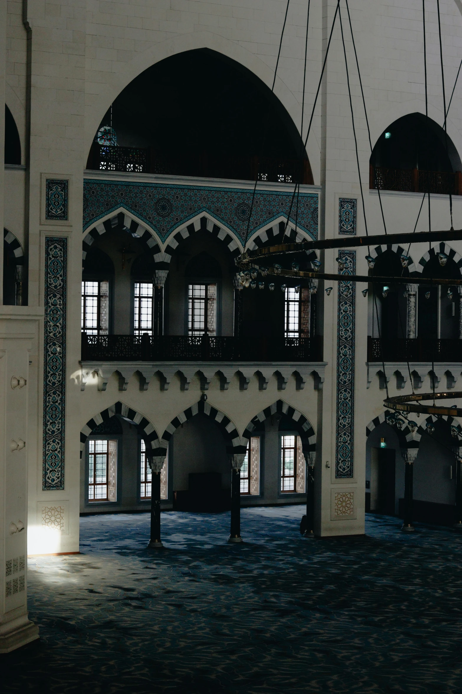 large room with several arches and lights inside