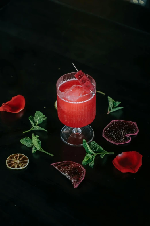 an image of a beverage with some orange and flowers