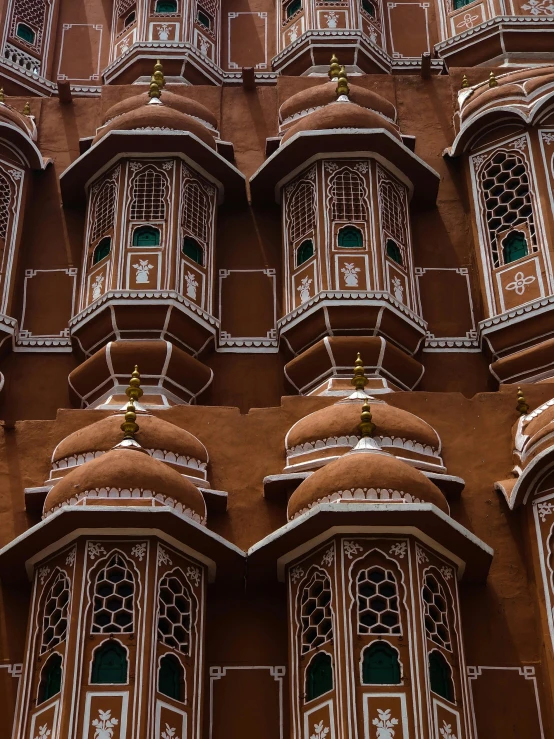 large building with ornate balconying and windows in the center