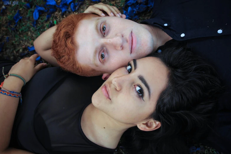 a man with freckles, and a woman with freckles on her