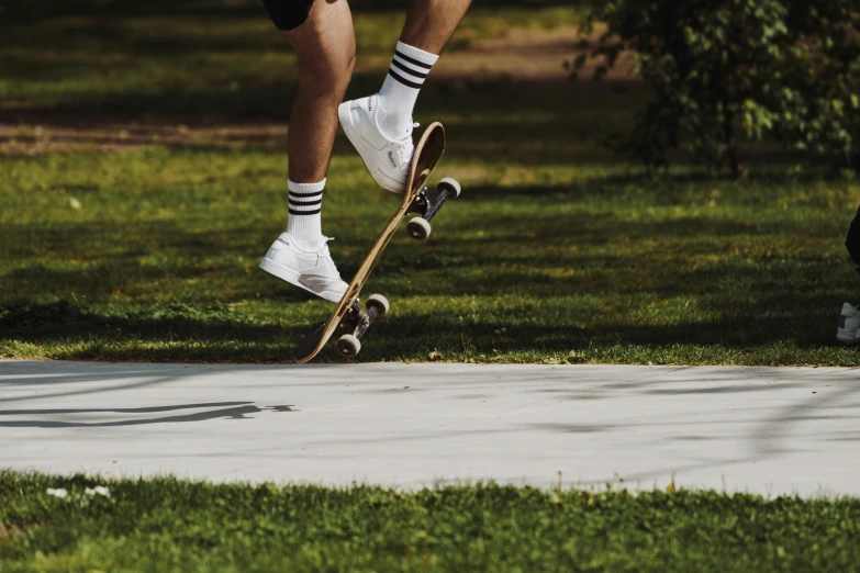 someone jumping in the air on their skateboard