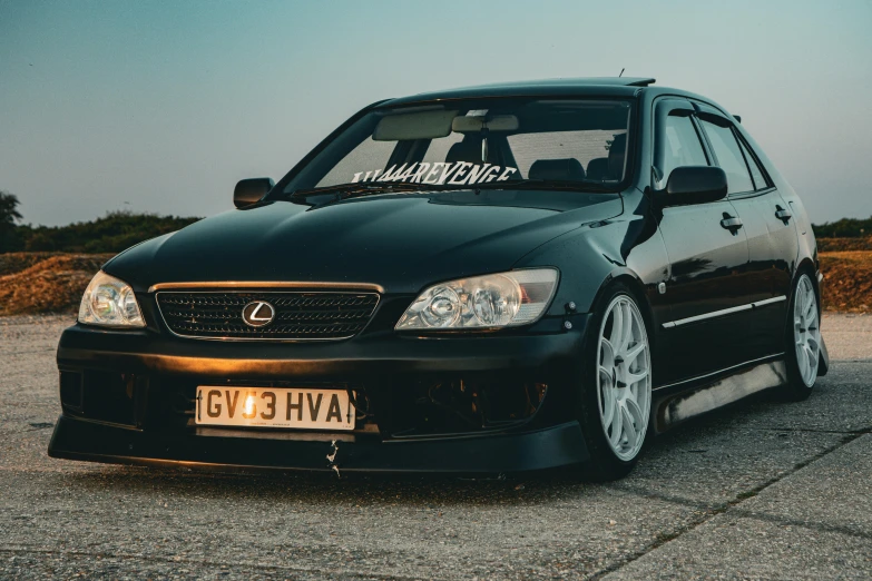 a very nice looking car parked on a parking lot