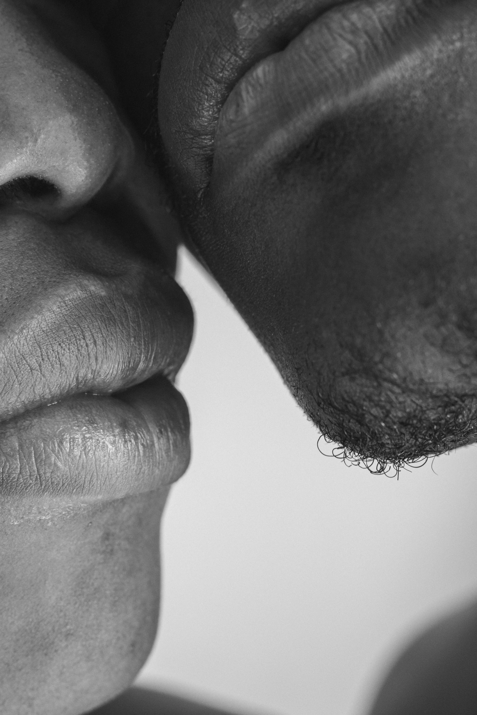 the lips of a man and woman looking to each other