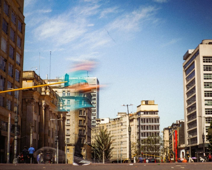 a bunch of buildings that are by a street