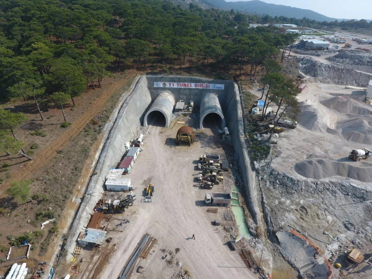 a large tunnel next to another tunnel under construction