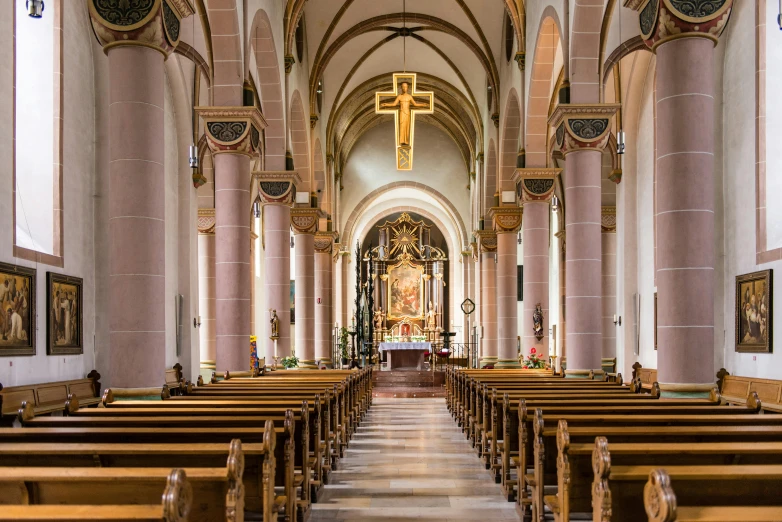 inside an elegant church with beautiful arches and paintings