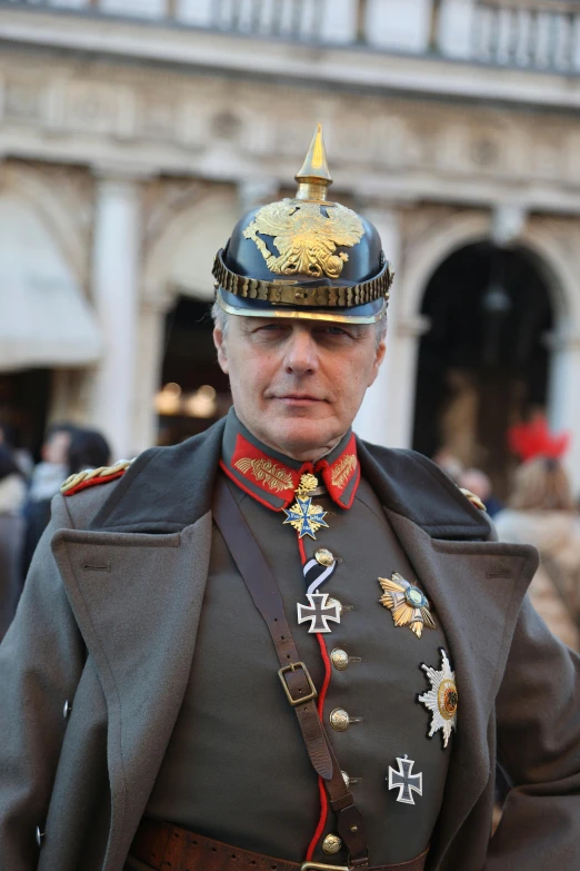 an officer in uniform is standing outside