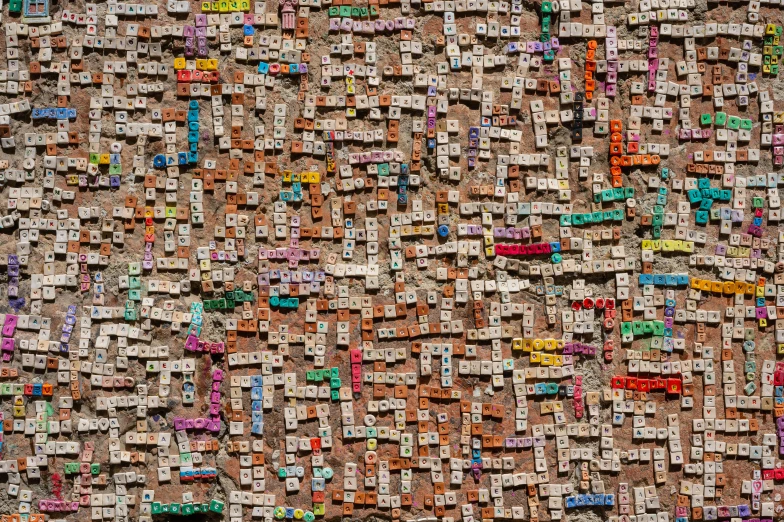 the mosaic image depicts a brown background with cars