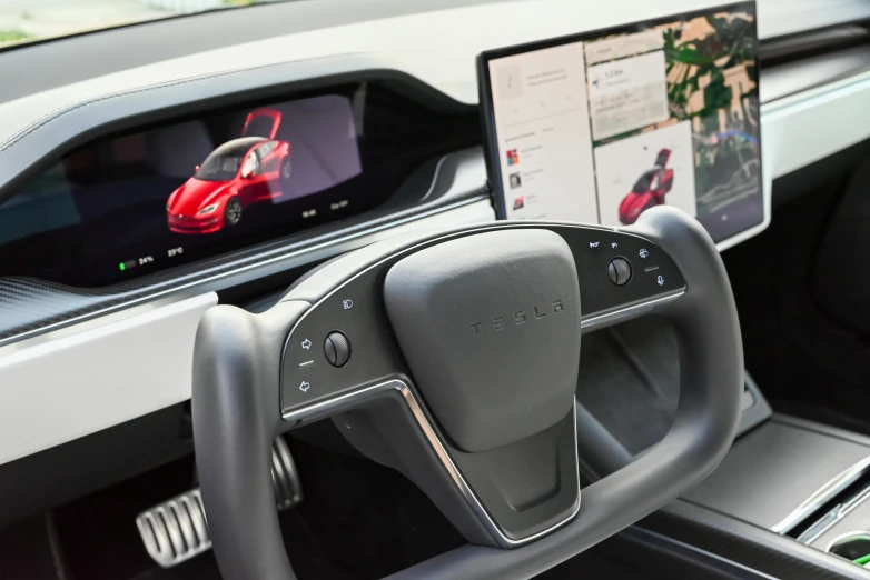 a car with its screen showing the inside view of a red car