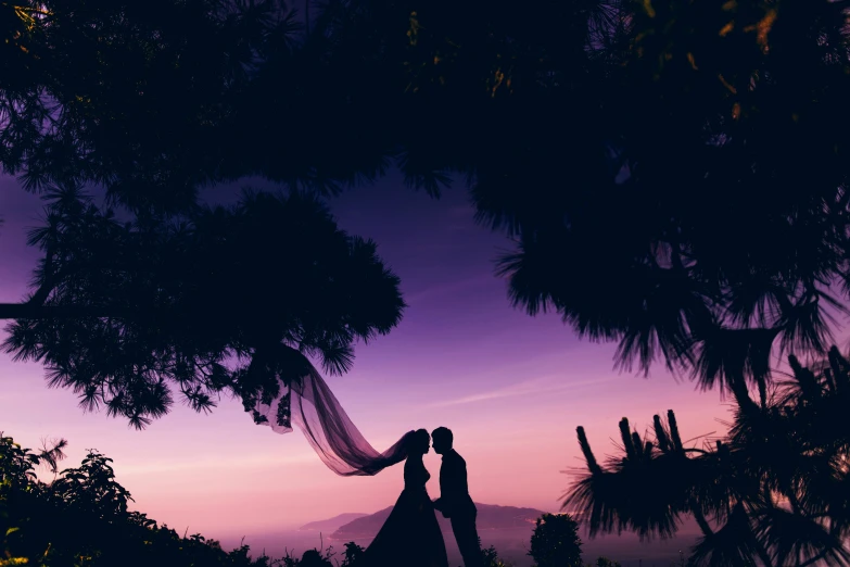 a person on a field holding a veil