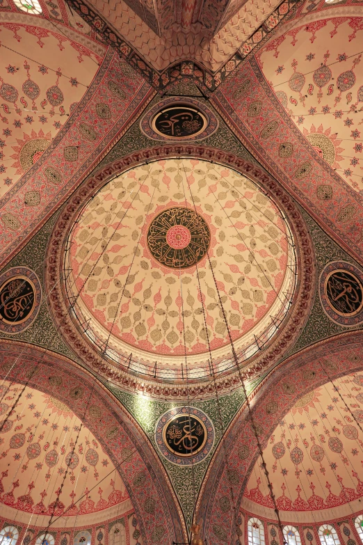 a close up of an intricate ceiling in a building