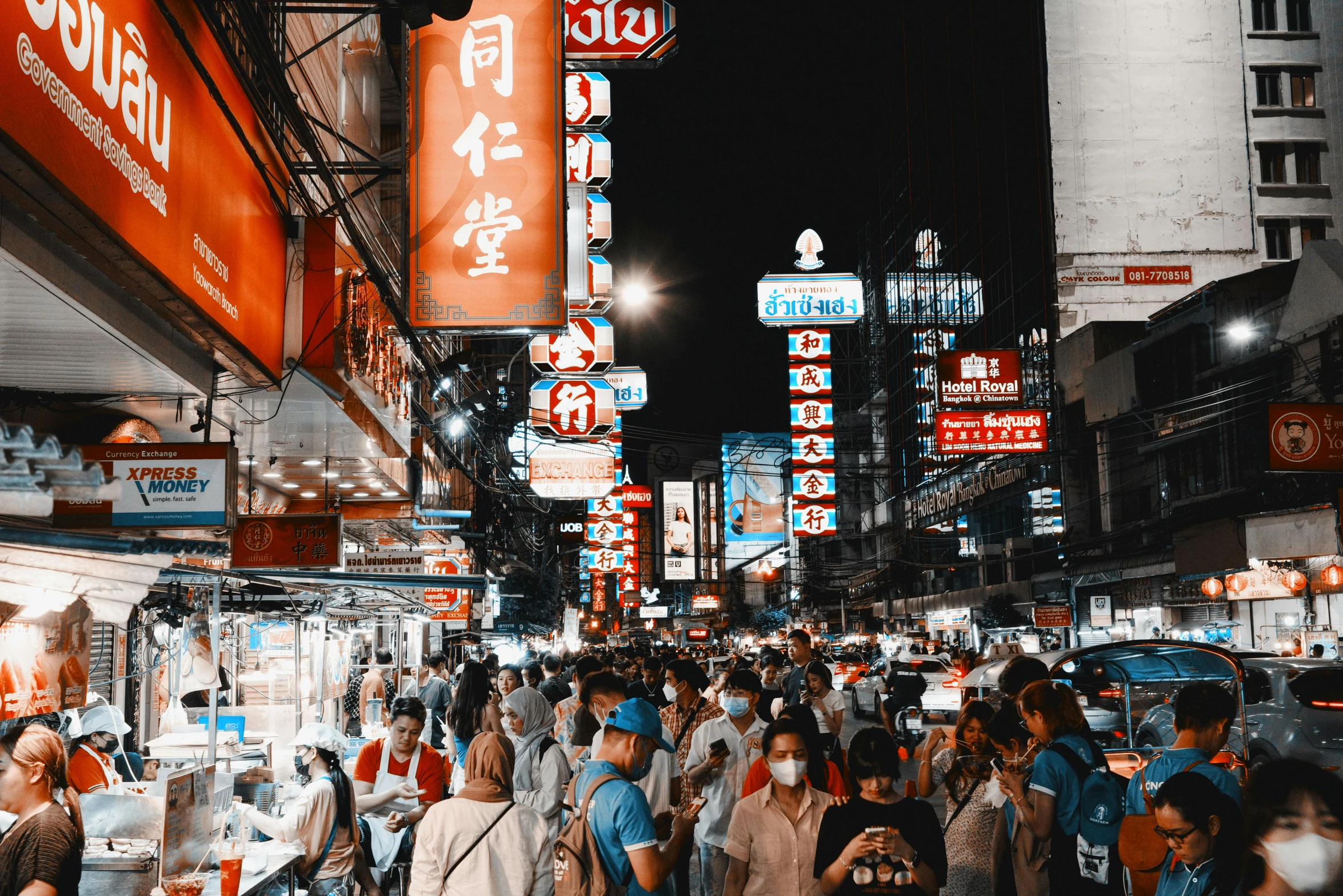 busy city street filled with lots of people