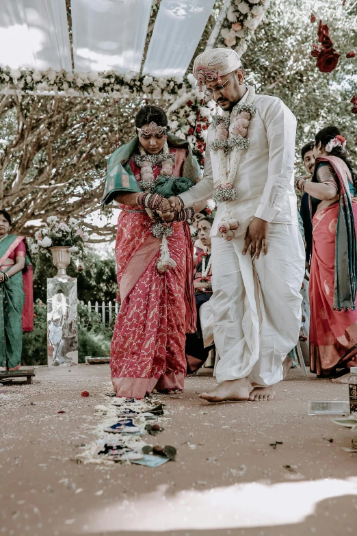 a couple getting married at their indian wedding