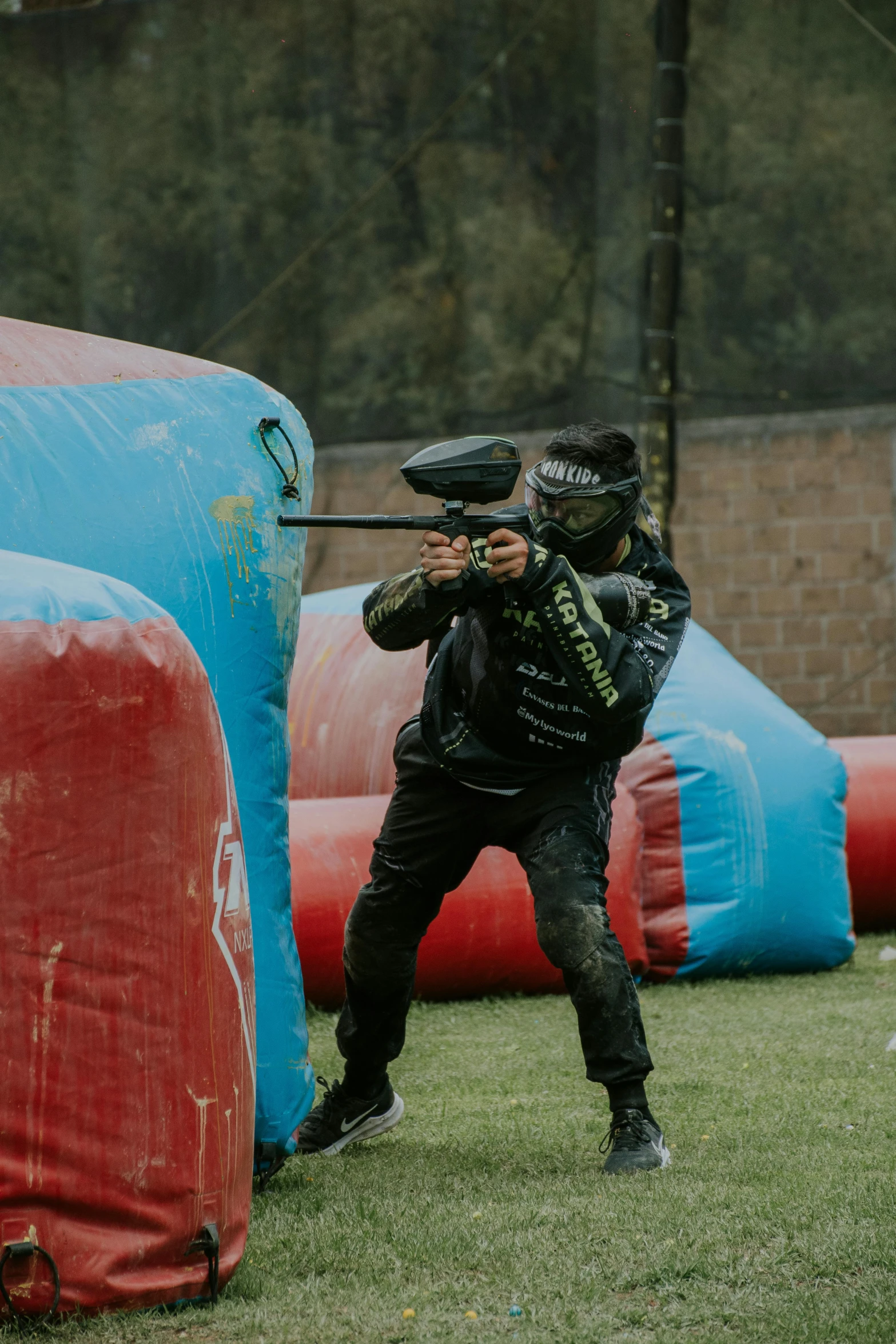 a man shooting a baseball in the park