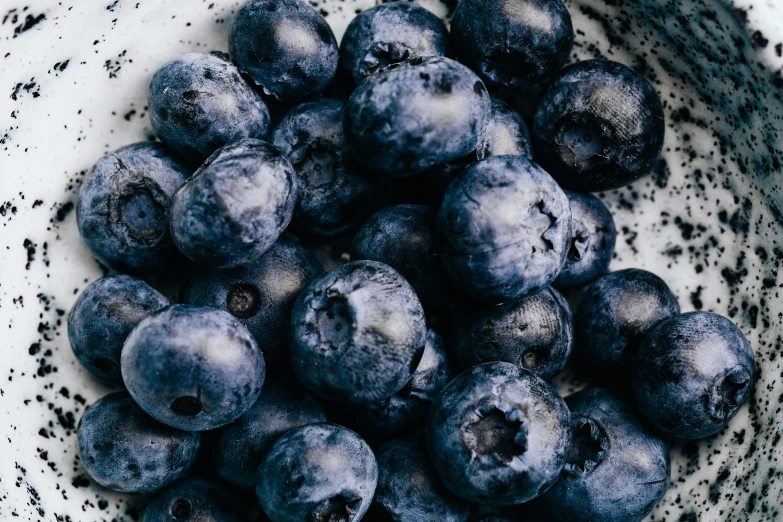 berries have been frozen in this white bowl