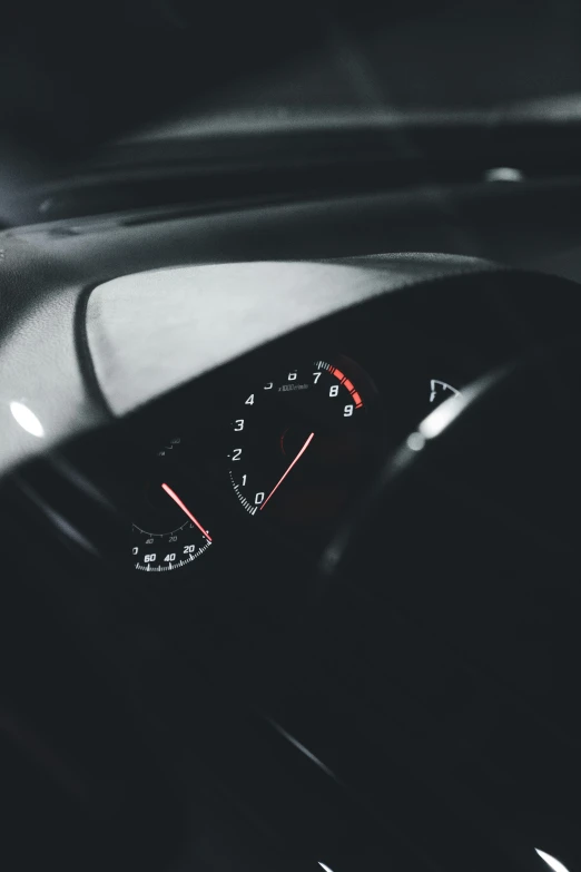 a gauge and meters inside the dash of a vehicle