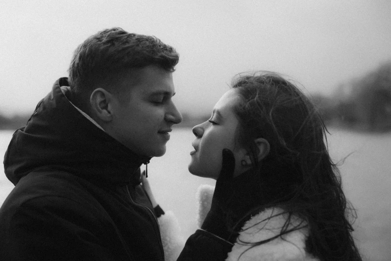 a couple looking at each other and touching foreheads