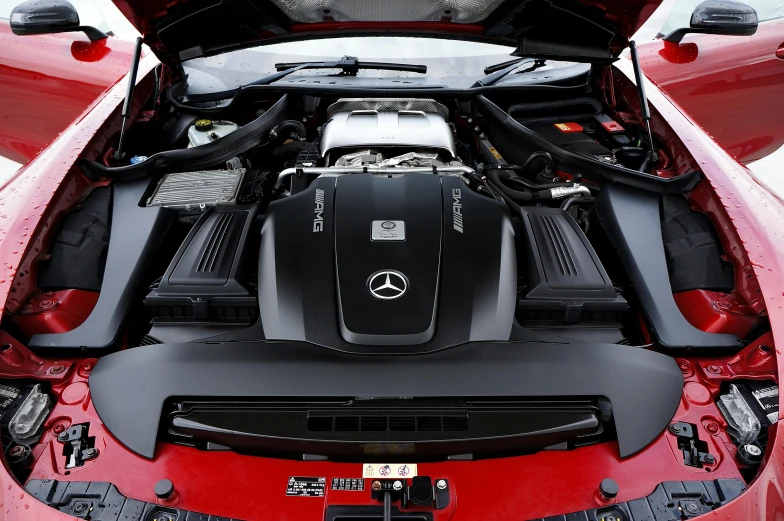 the back of a mercedes cls with the engine hood up