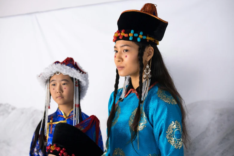 two asian women standing side by side