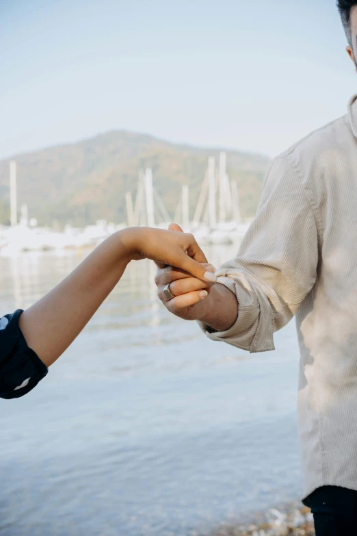 an image of a man holding on to a womans arm