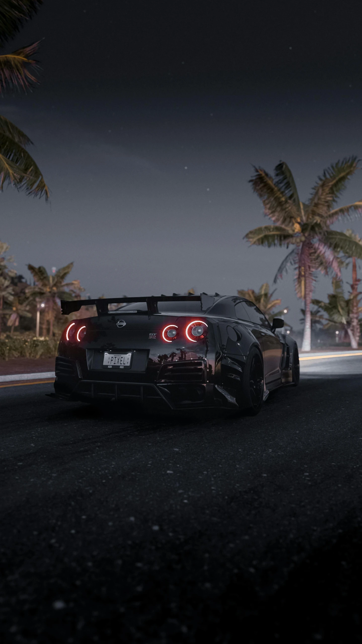 a supercars parked on a road next to palm trees