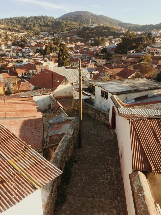 a view of an old town down a hill