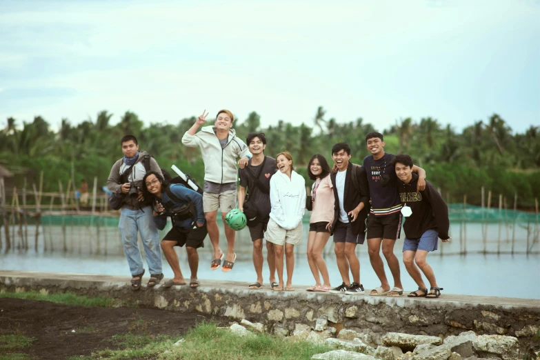 a group of people standing next to each other