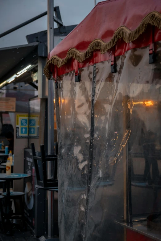 large clear plastic cover covers the outside of a restaurant