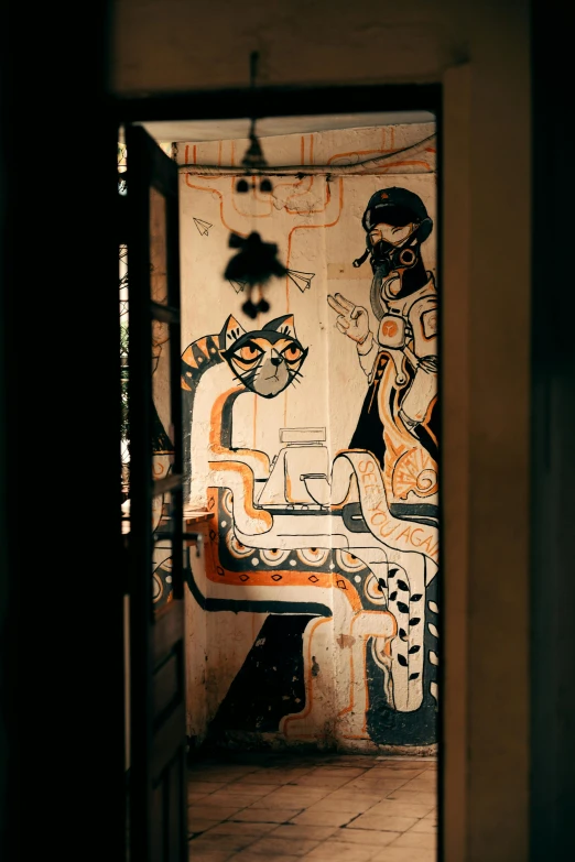 a door that leads out to an artistic painted wall