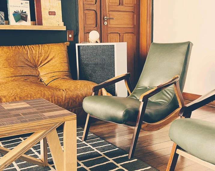 living room with leather furniture and wooden doors