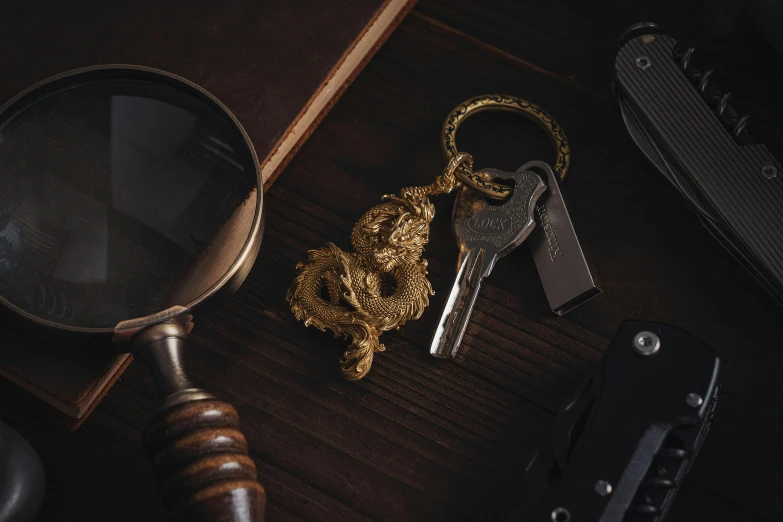 a magnifying glass and a ss key on a wood table