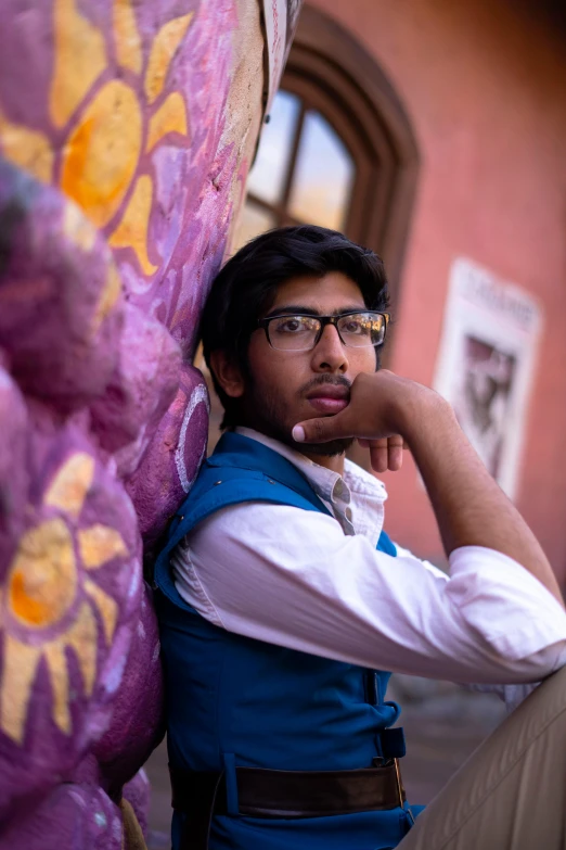 a man standing behind a giant stuffed animal