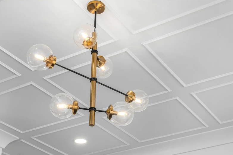 a light fixture hangs over the ceiling of a room