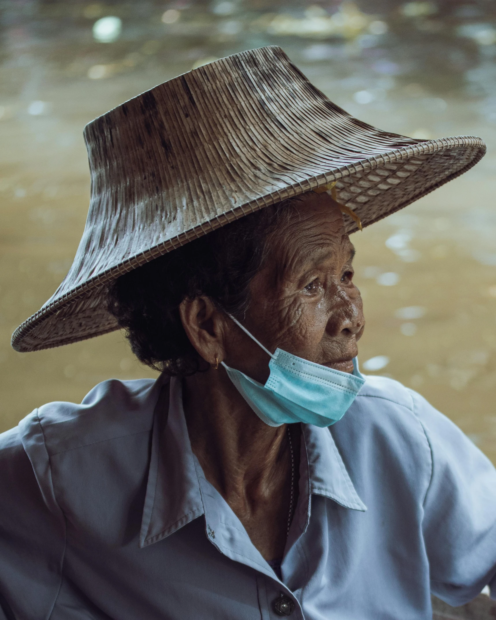 an elderly woman wearing a face mask