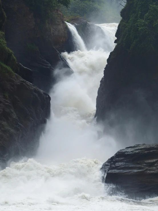 a waterfall with white water and many rapids