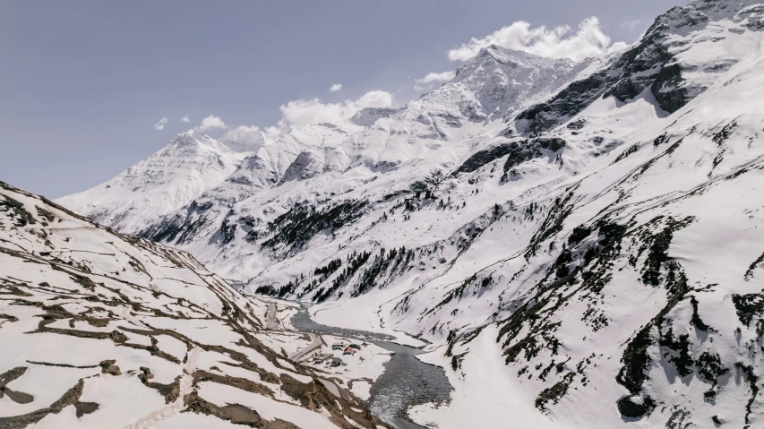 mountains in the snow are covered with snow