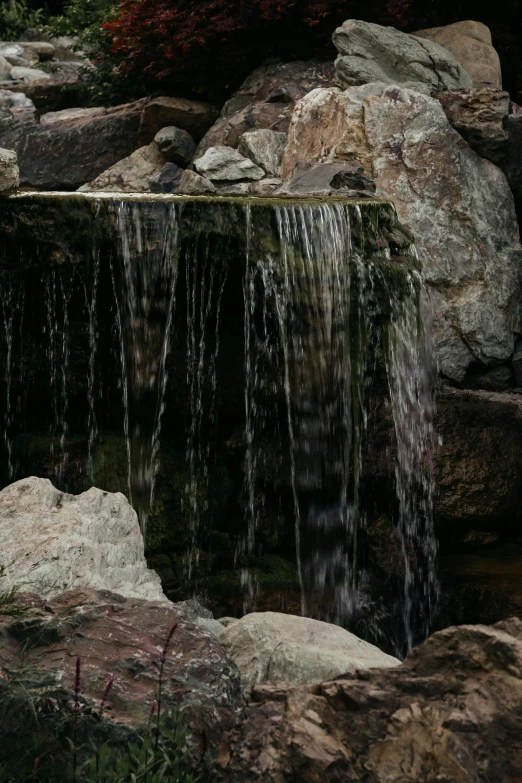 an image of a waterfall with clear water