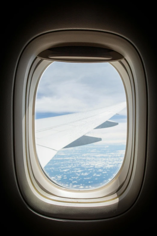 an airplane window showing the inside of it