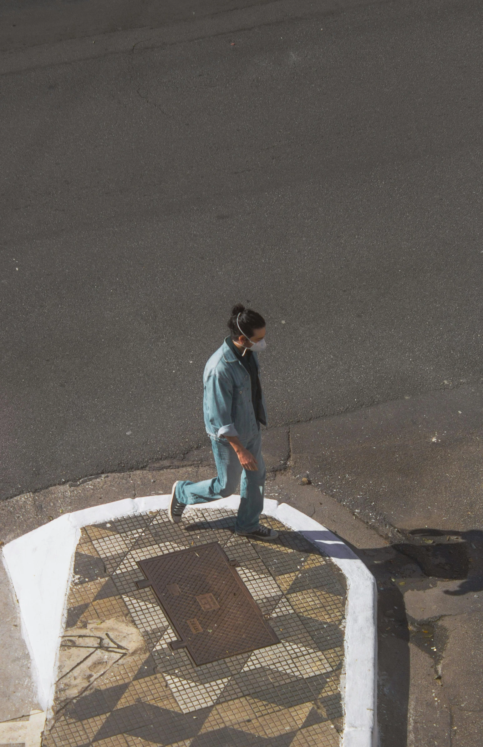 a woman standing on the side walk