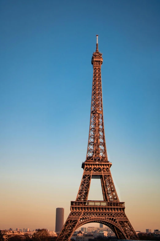 the eiffel tower is made of steel and has a clock on it