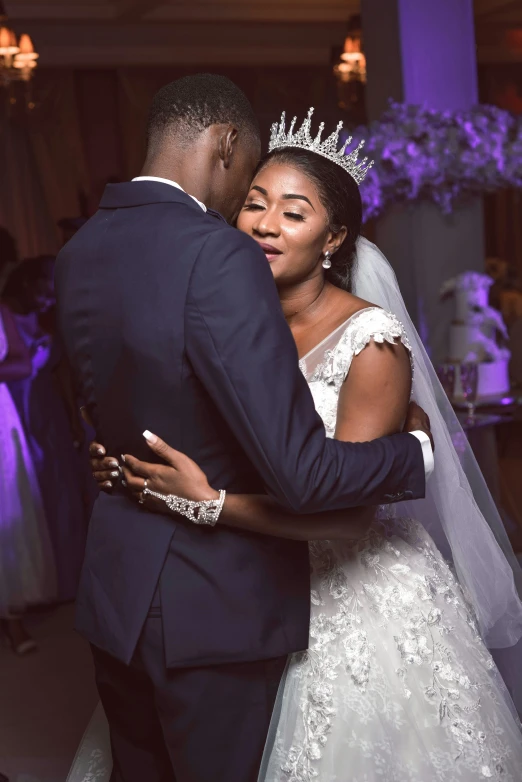 bride and groom emcing in front of an audience